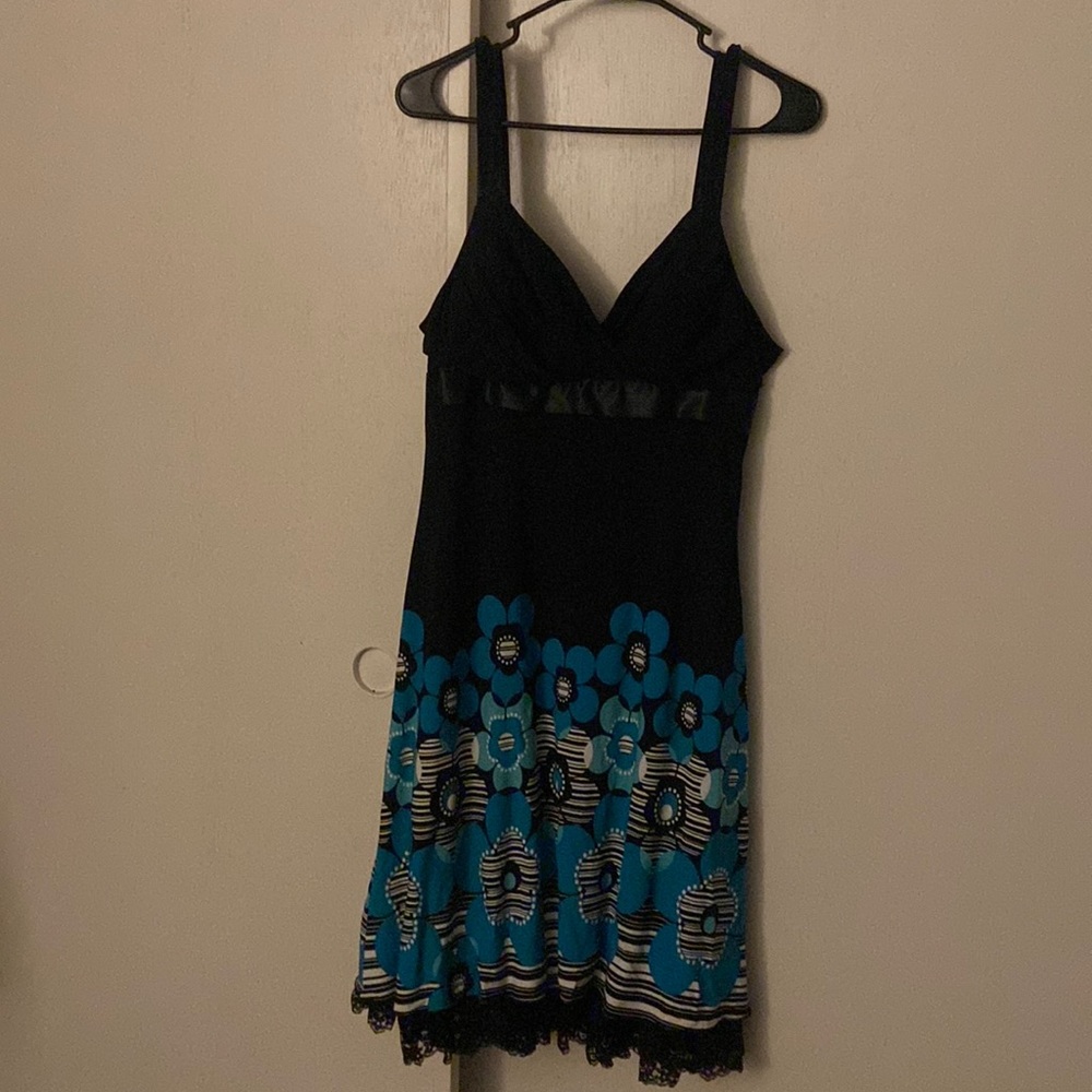 Black dress with blue abs black geometric flowers.